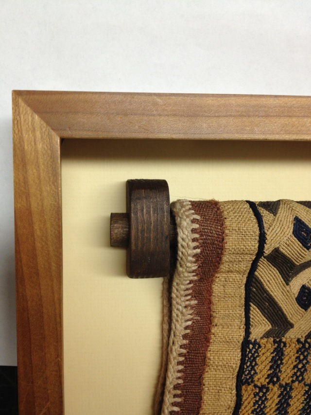 Custom bracket for woven textile art.